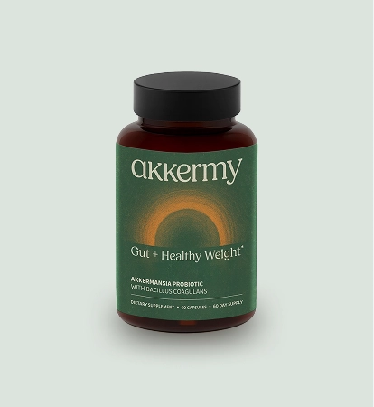Bottle of Akkermy Gut + Healthy Weight dietary supplement with Akkermansia probiotic and Bacillus coagulans.